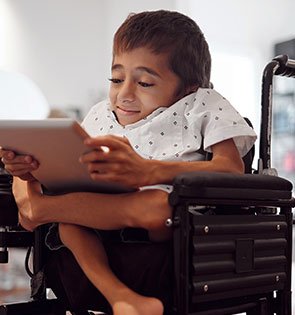 Disability support worker assisting participant in wheelchair - Respected Care Broadameadows